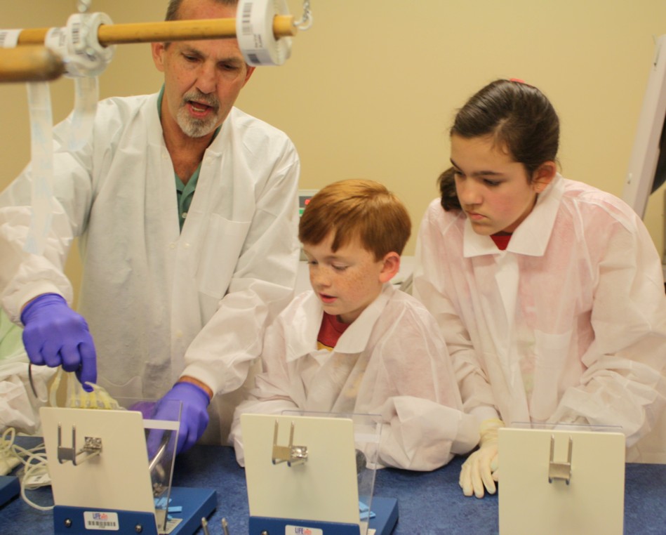 Getting a lesson in how to separate the red cells Getting a lesson in how to separate the red cells